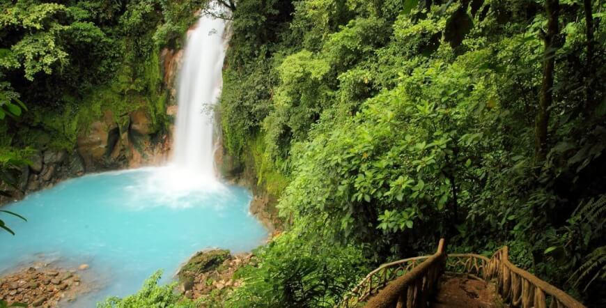 Guanacaste ⇆ La Fortuna with Rio Celeste Waterfall Hike